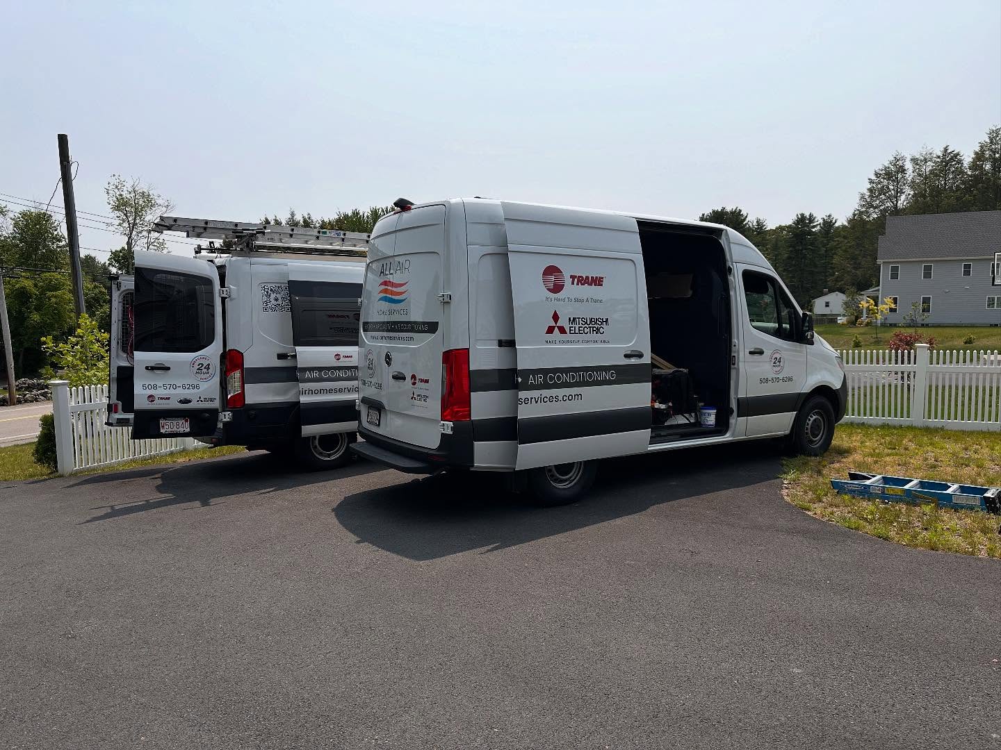 All Air Home Services vans at a residential property