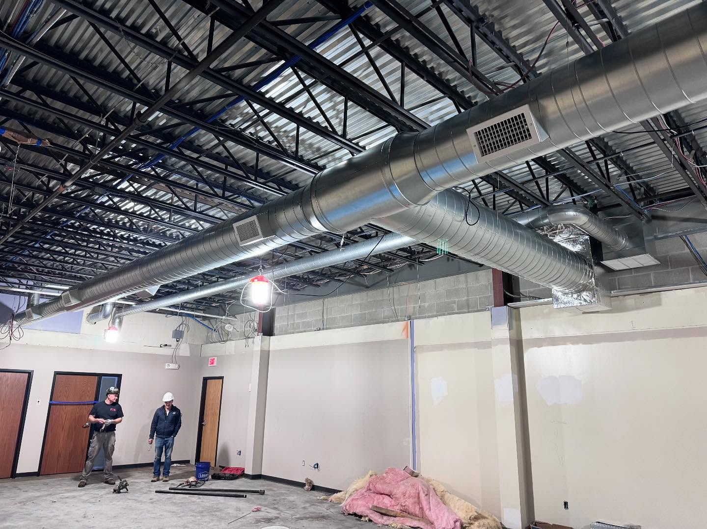 Crew on a commercial ductwork project